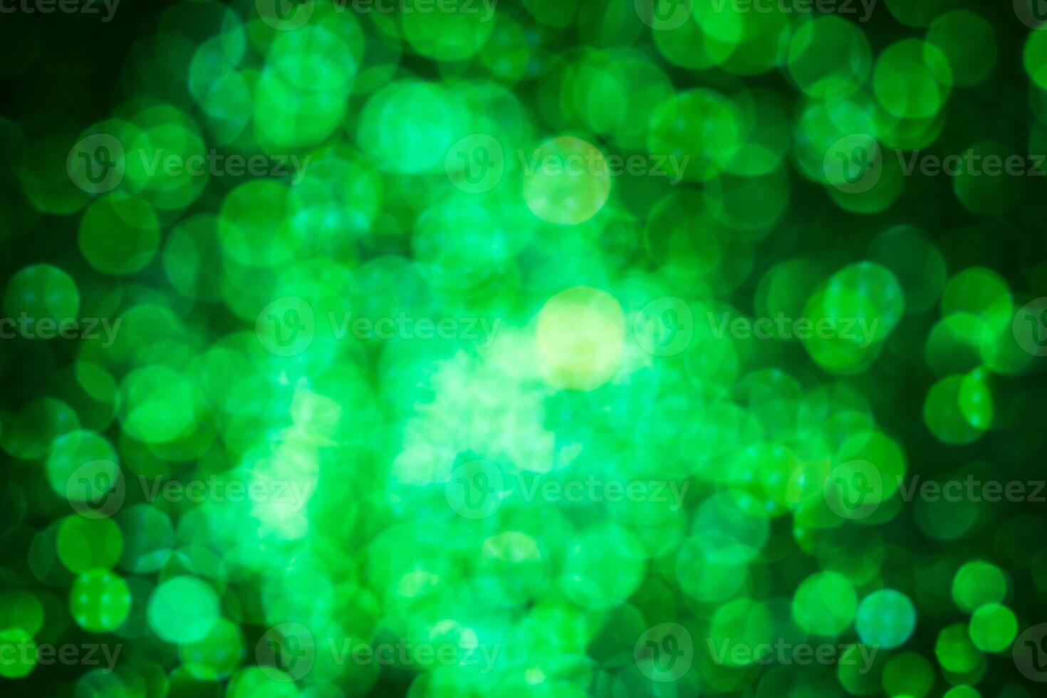 Green lights abstract bokeh backdrop. Chrismas lights bokeh. photo