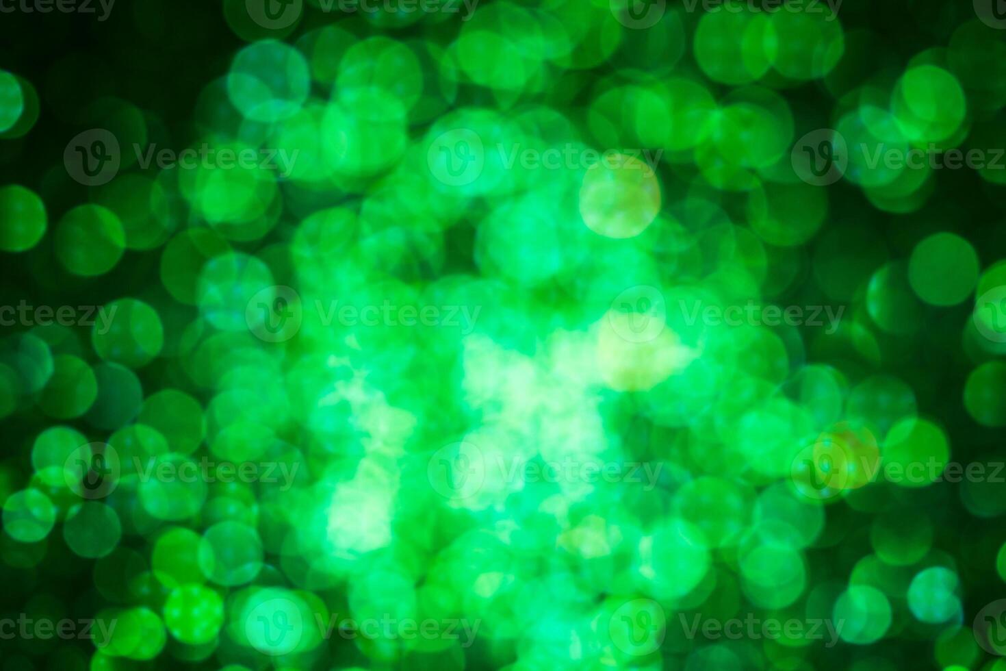 Green lights abstract bokeh backdrop. Chrismas lights bokeh. photo