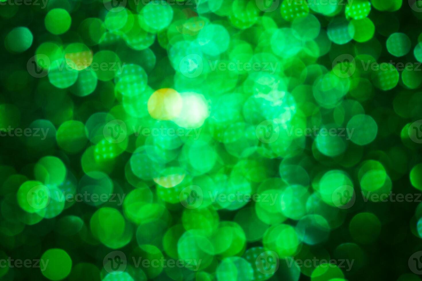 Green lights abstract bokeh backdrop. Chrismas lights bokeh. photo