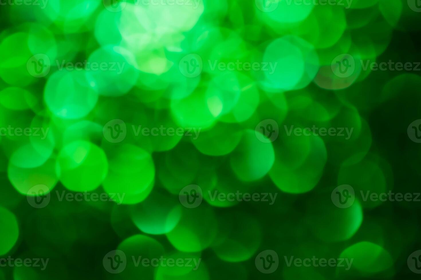 Green lights abstract bokeh backdrop. Chrismas lights bokeh. photo