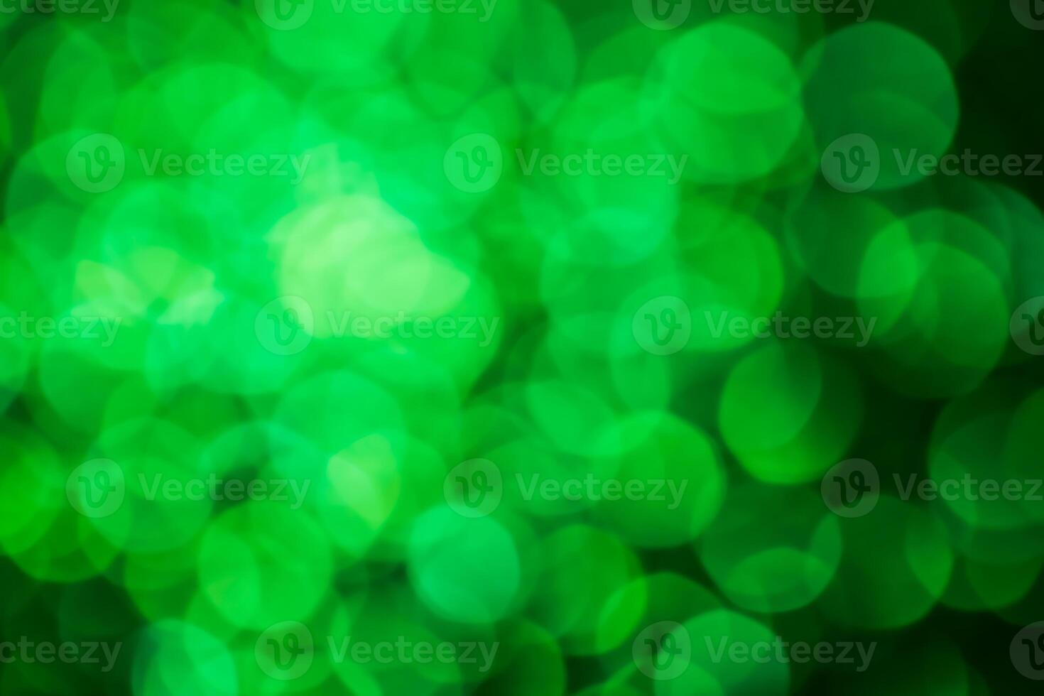 Green lights abstract bokeh backdrop. Chrismas lights bokeh. photo