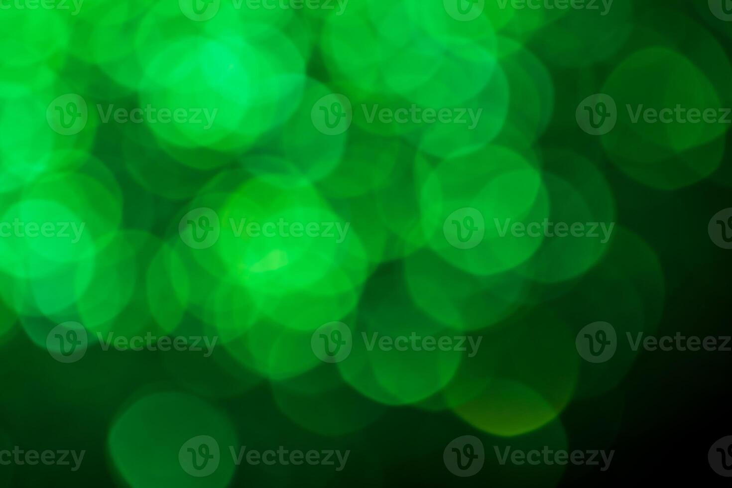Green lights abstract bokeh backdrop. Chrismas lights bokeh. photo
