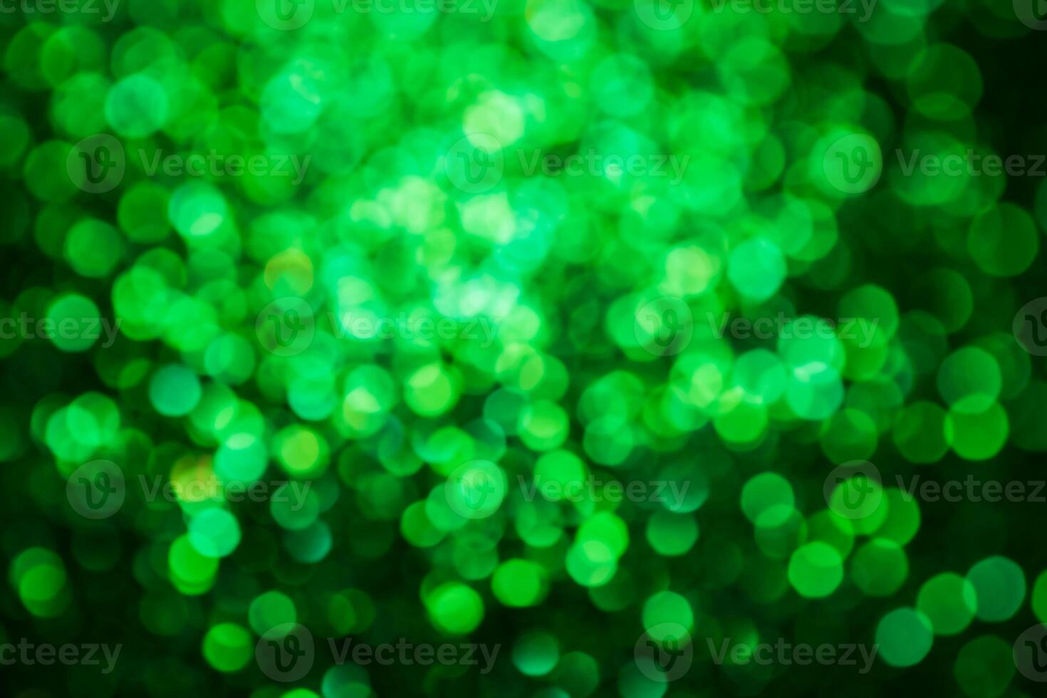 Green lights abstract bokeh backdrop. Chrismas lights bokeh. photo