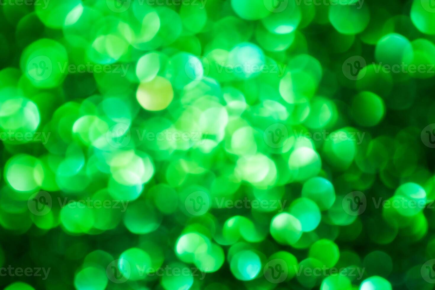 Green lights abstract bokeh backdrop. Chrismas lights bokeh. photo