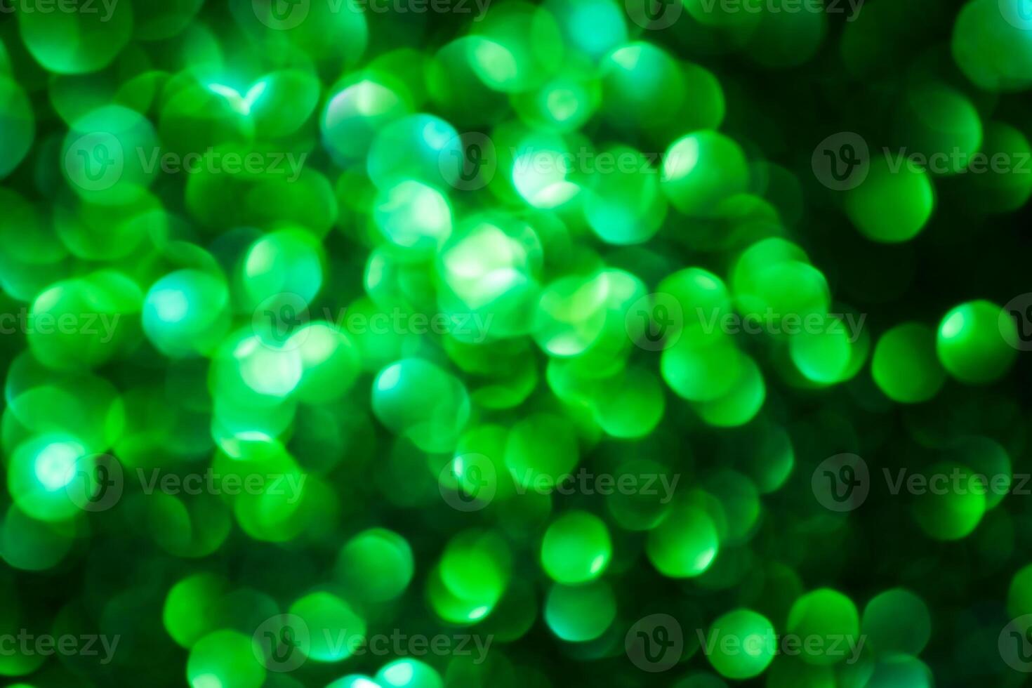 Green lights abstract bokeh backdrop. Chrismas lights bokeh. photo