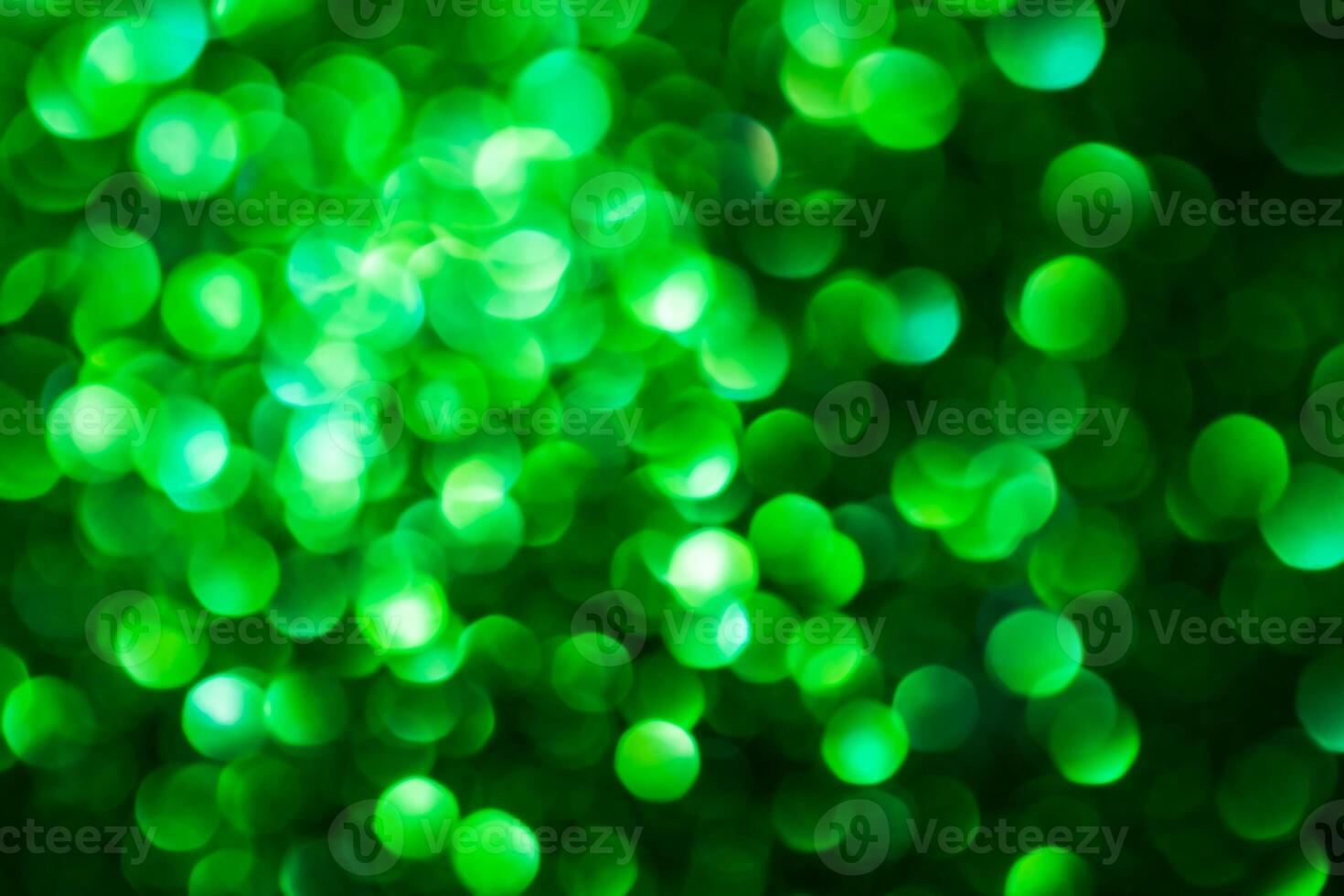 Green lights abstract bokeh backdrop. Chrismas lights bokeh. photo