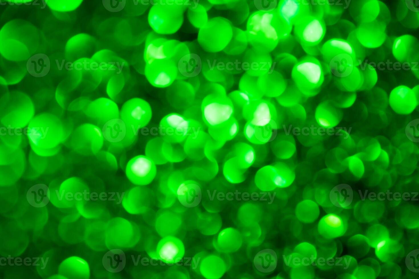 Green lights abstract bokeh backdrop. Chrismas lights bokeh. photo