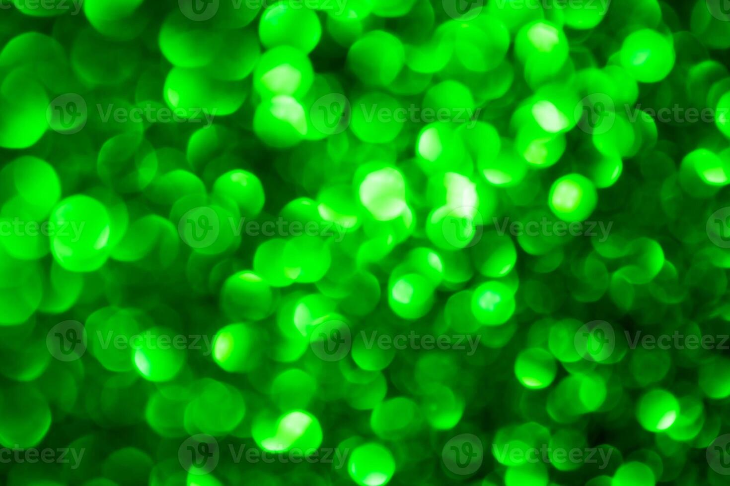 Green lights abstract bokeh backdrop. Chrismas lights bokeh. photo