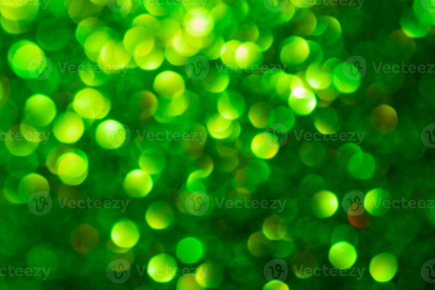 Green lights abstract bokeh backdrop. Chrismas lights bokeh. photo