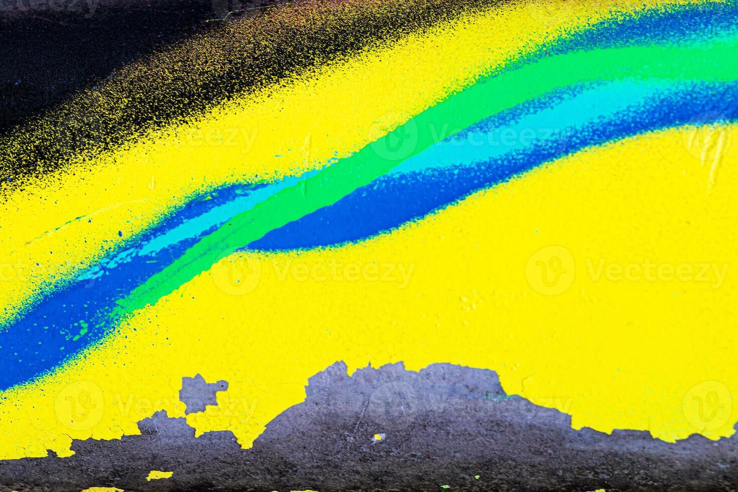 A fragment of colorful graffiti painted on a brick wall. Abstract backdrop for design. photo