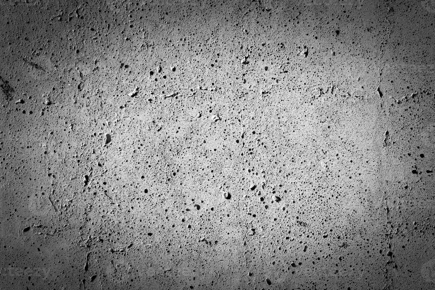 Gray concrete texture with vignette. Abstract grunge background with copy space. photo