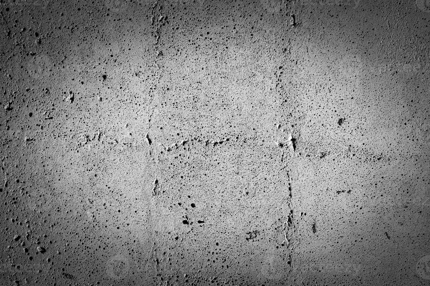 Gray concrete texture with vignette. Abstract grunge background with copy space. photo