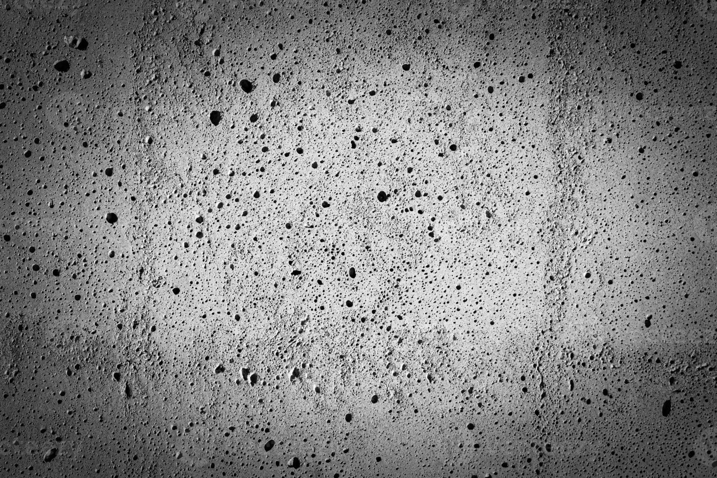 Gray concrete texture with vignette. Abstract grunge background with copy space. photo
