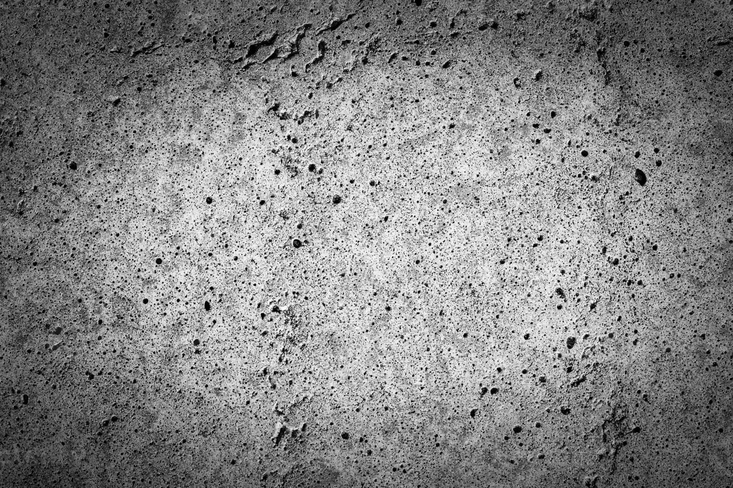 Gray concrete texture with vignette. Abstract grunge background with copy space. photo