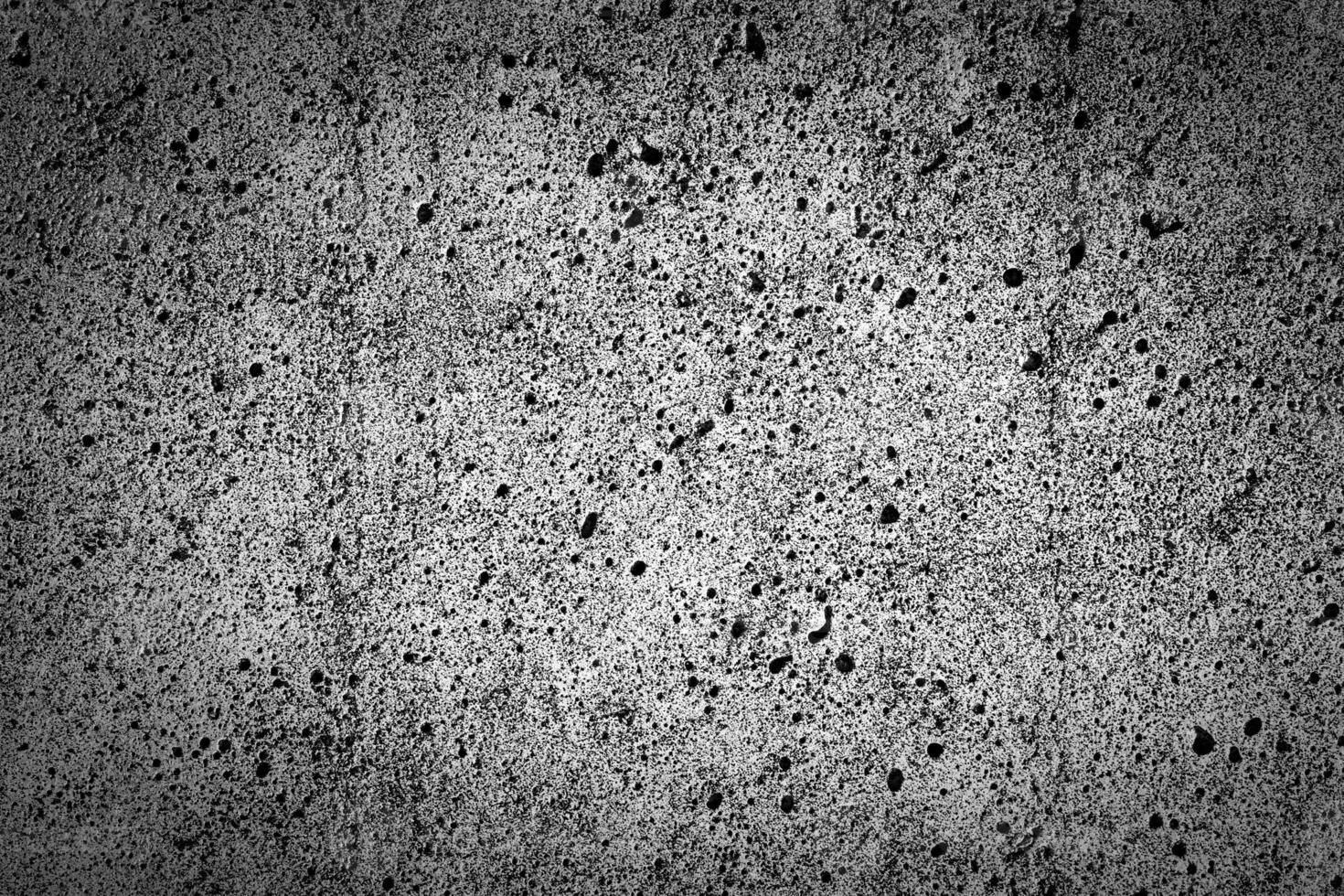 Gray concrete texture with vignette. Abstract grunge background with copy space. photo