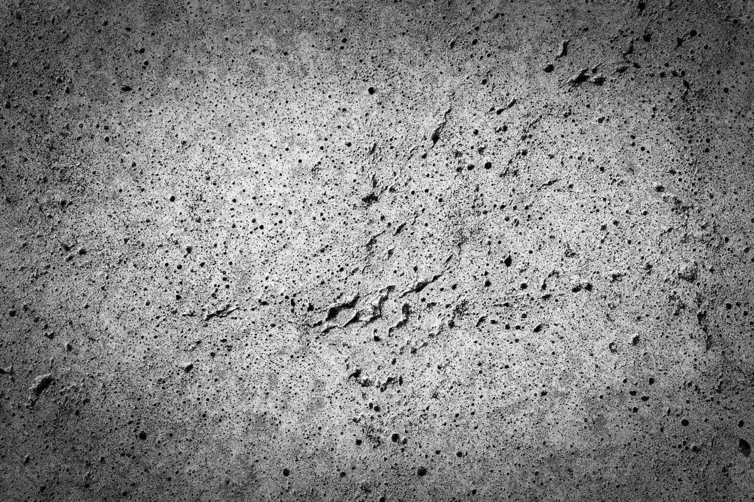 Gray concrete texture with vignette. Abstract grunge background with copy space. photo