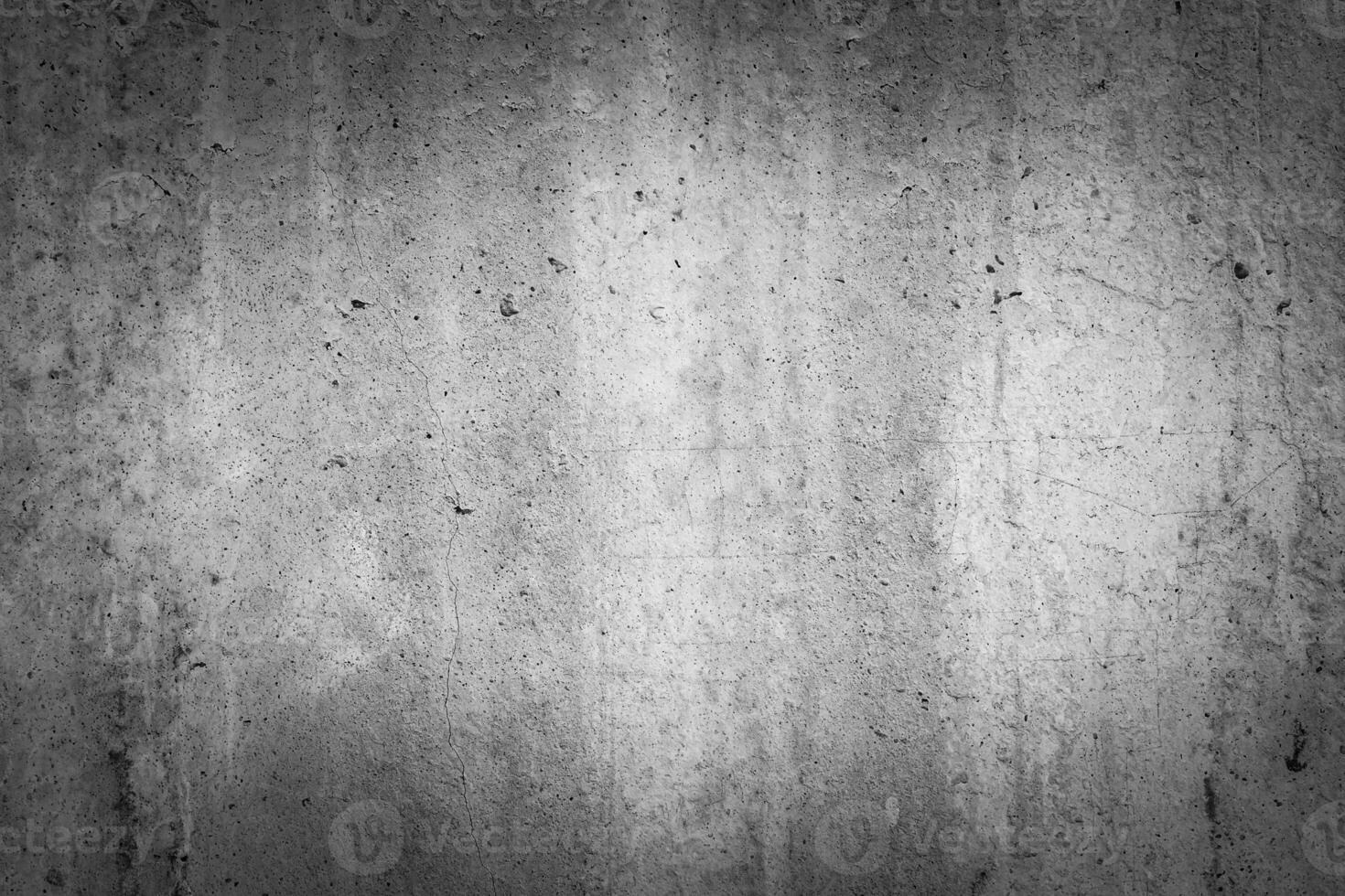 Gray concrete texture with vignette. Abstract grunge background with copy space. photo