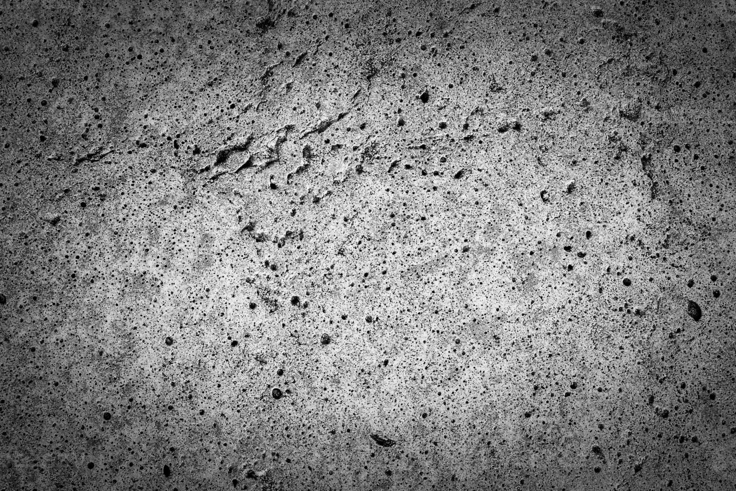 Gray concrete texture with vignette. Abstract grunge background with copy space. photo