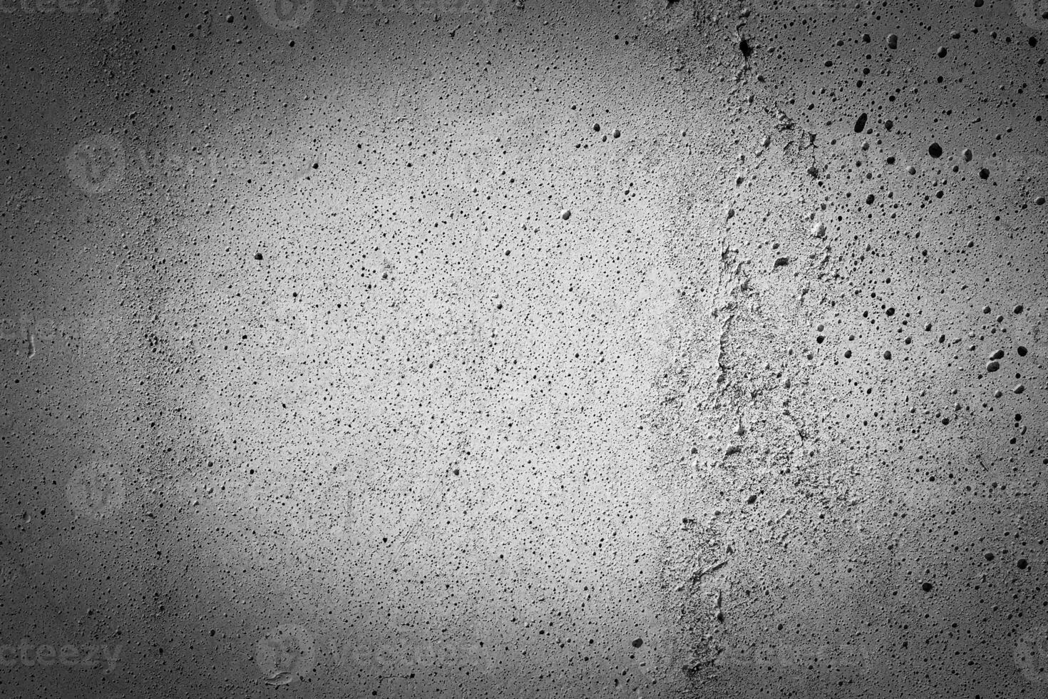 Gray concrete texture with vignette. Abstract grunge background with copy space. photo