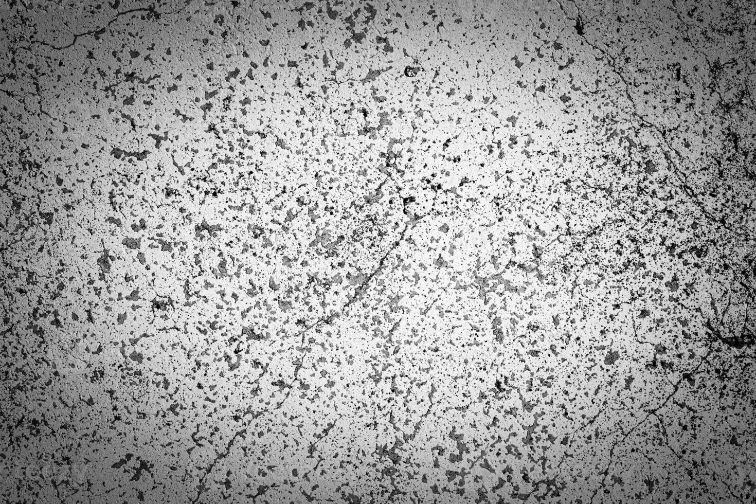 Gray concrete texture with vignette. Abstract grunge background with copy space. photo