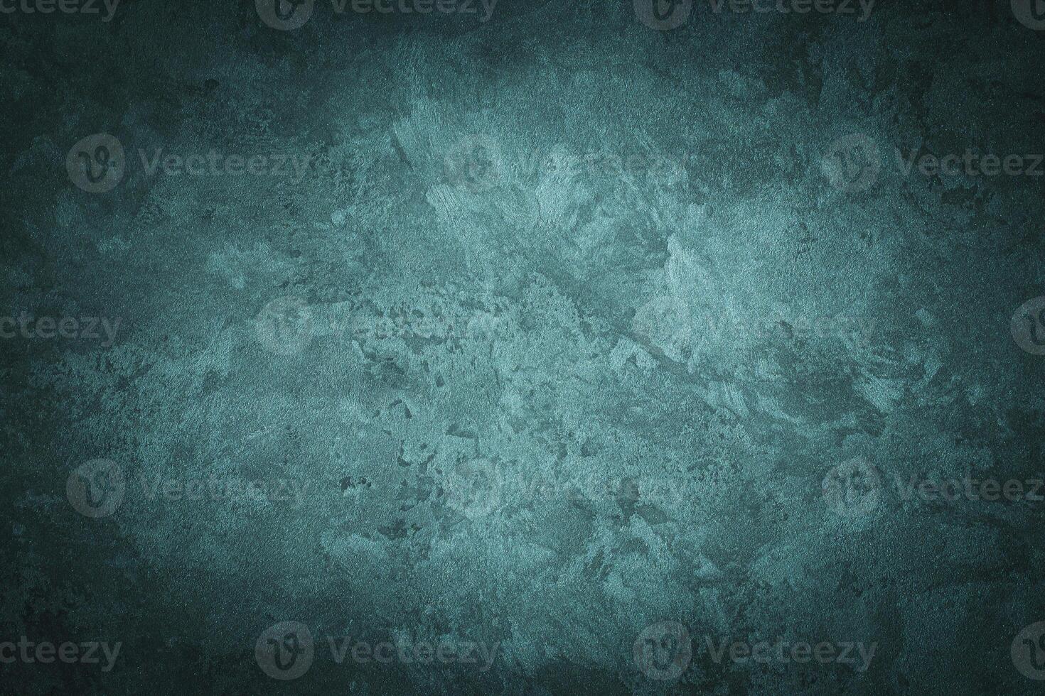 Cyan decorative plaster texture with vignette. Abstract grunge background with copy space. photo