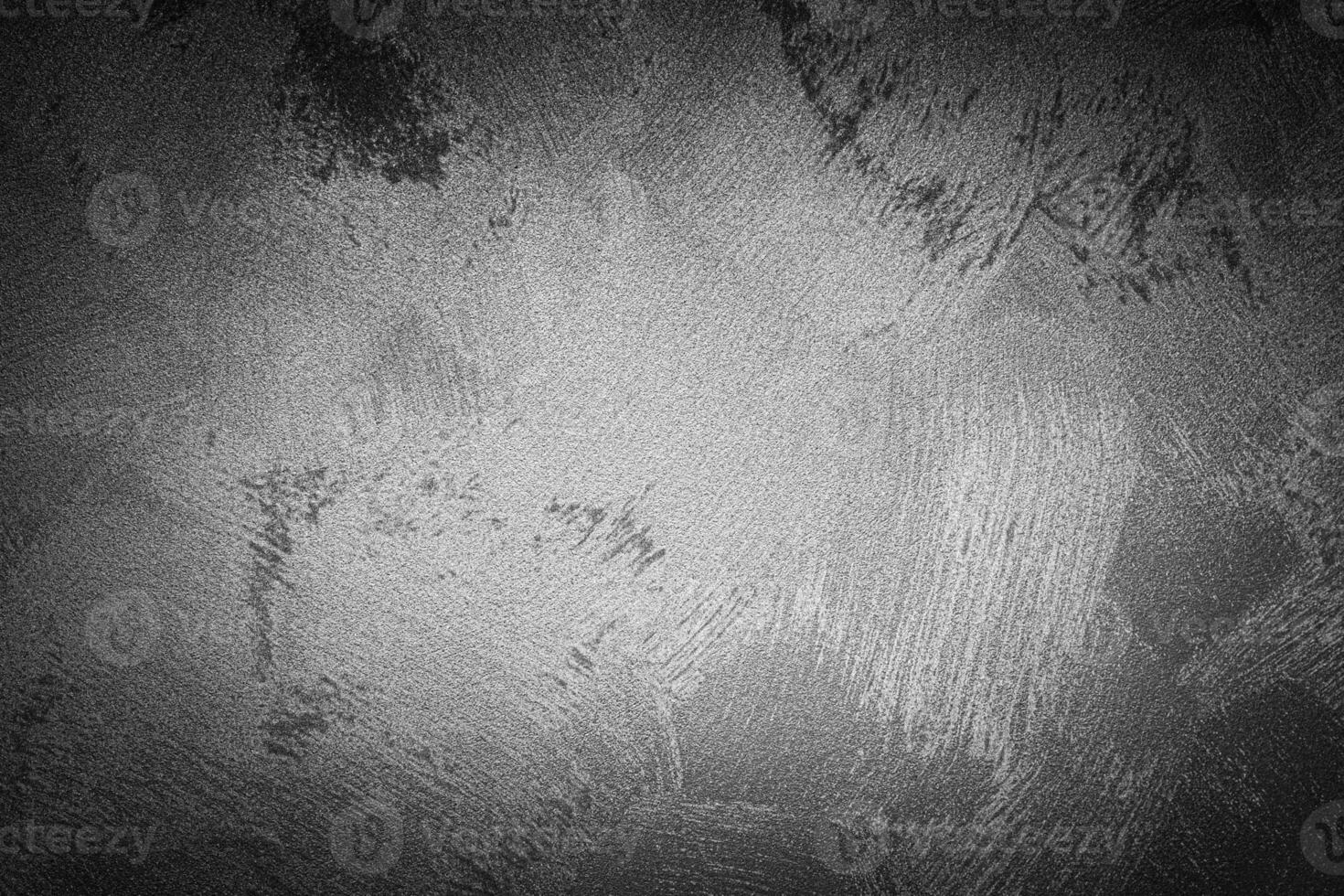 Gray decorative plaster texture with vignette. Abstract grunge background with copy space. photo