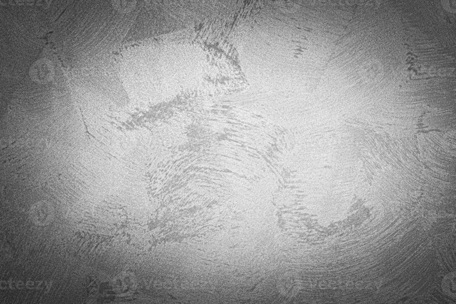 Gray decorative plaster texture with vignette. Abstract grunge background with copy space. photo