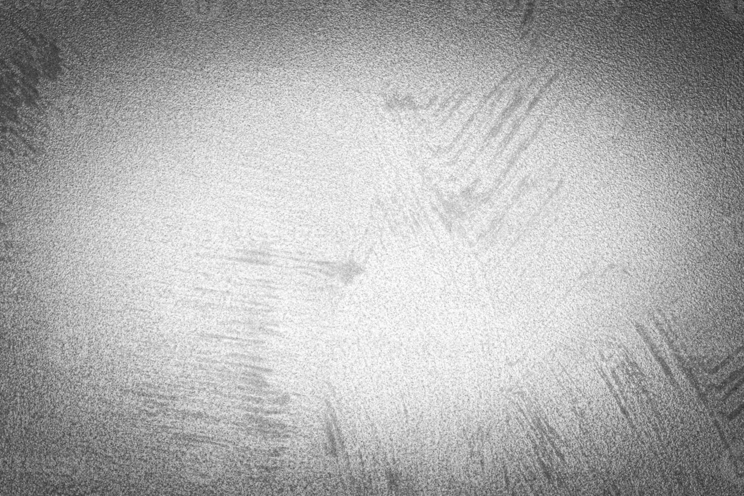 Gray decorative plaster texture with vignette. Abstract grunge background with copy space. photo