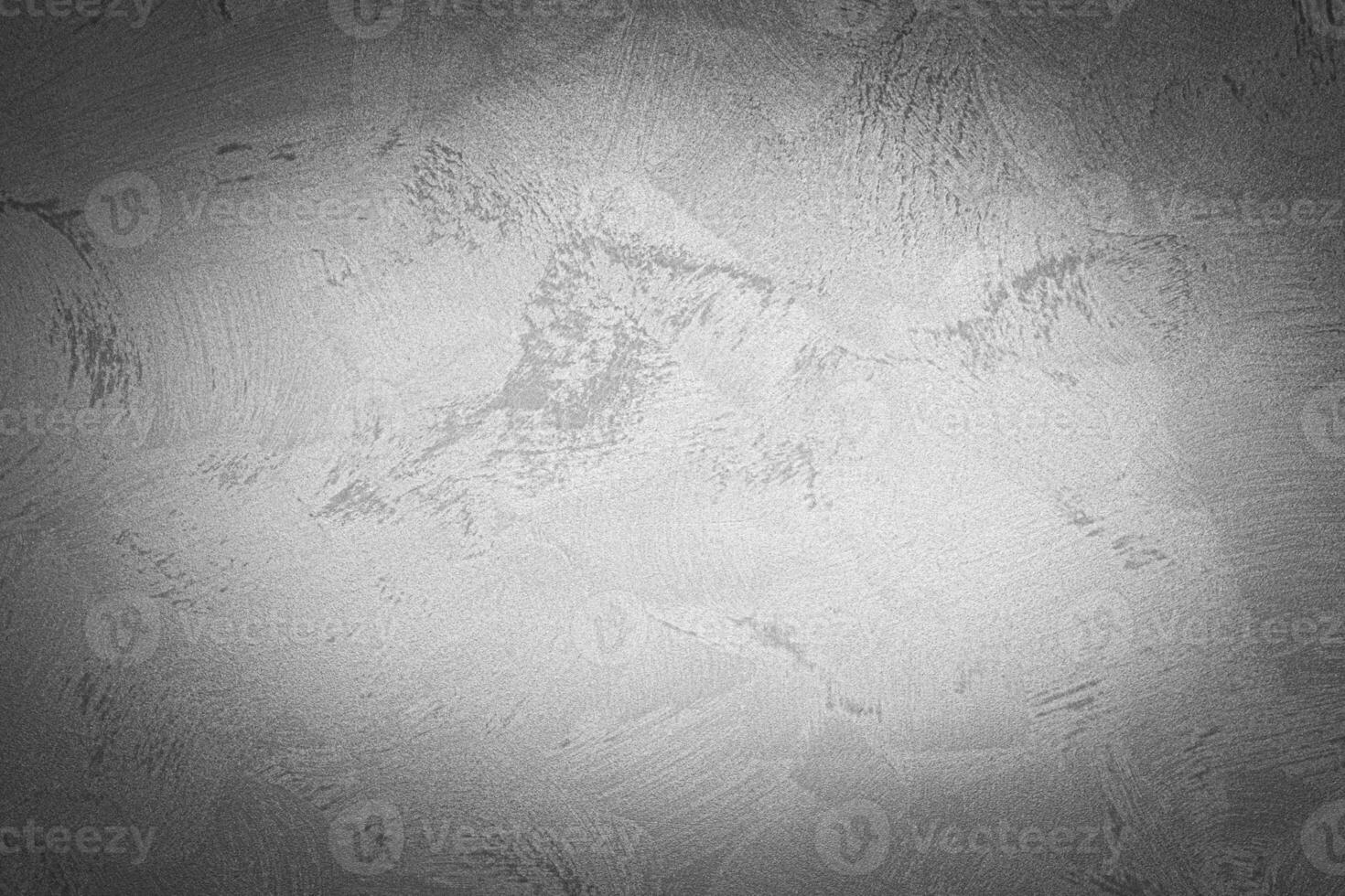 Gray decorative plaster texture with vignette. Abstract grunge background with copy space. photo