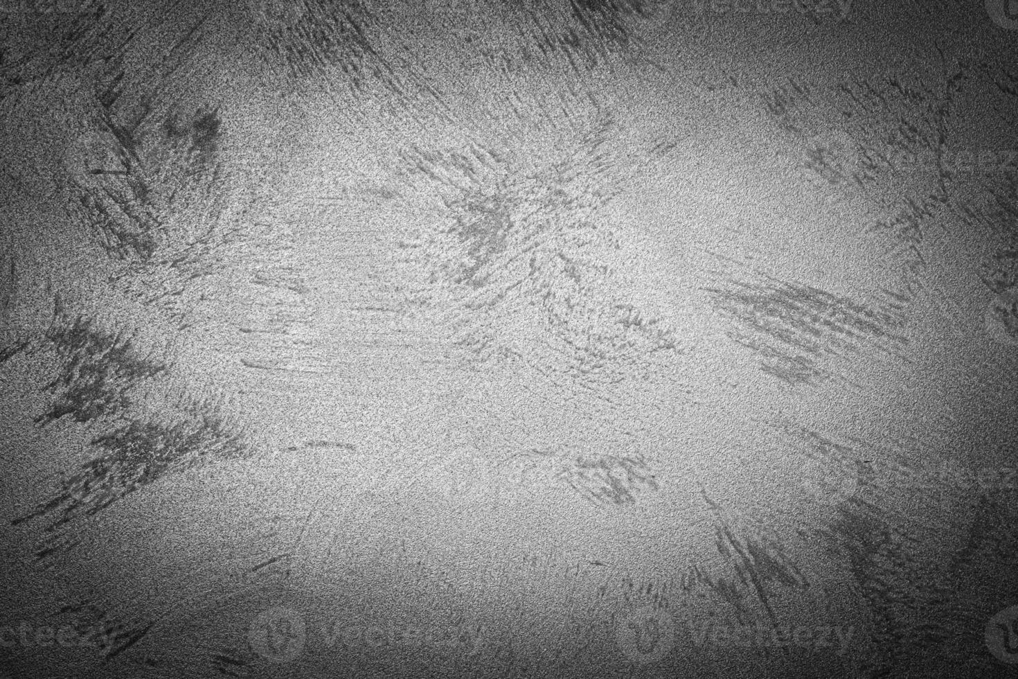 Gray decorative plaster texture with vignette. Abstract grunge background with copy space. photo