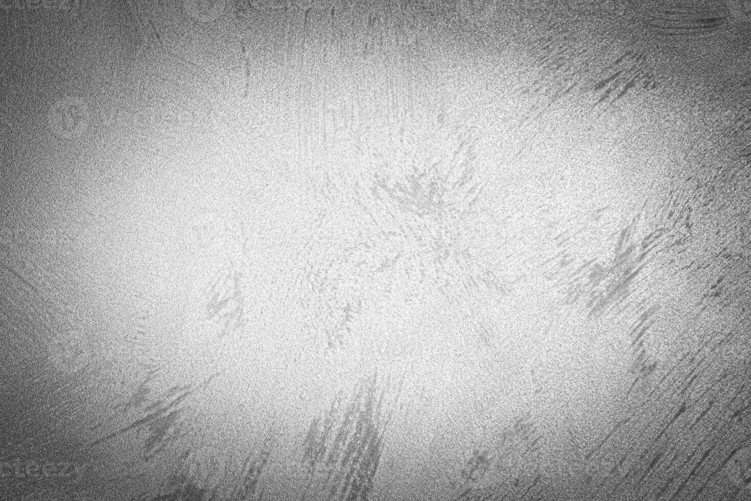 Gray decorative plaster texture with vignette. Abstract grunge background with copy space. photo
