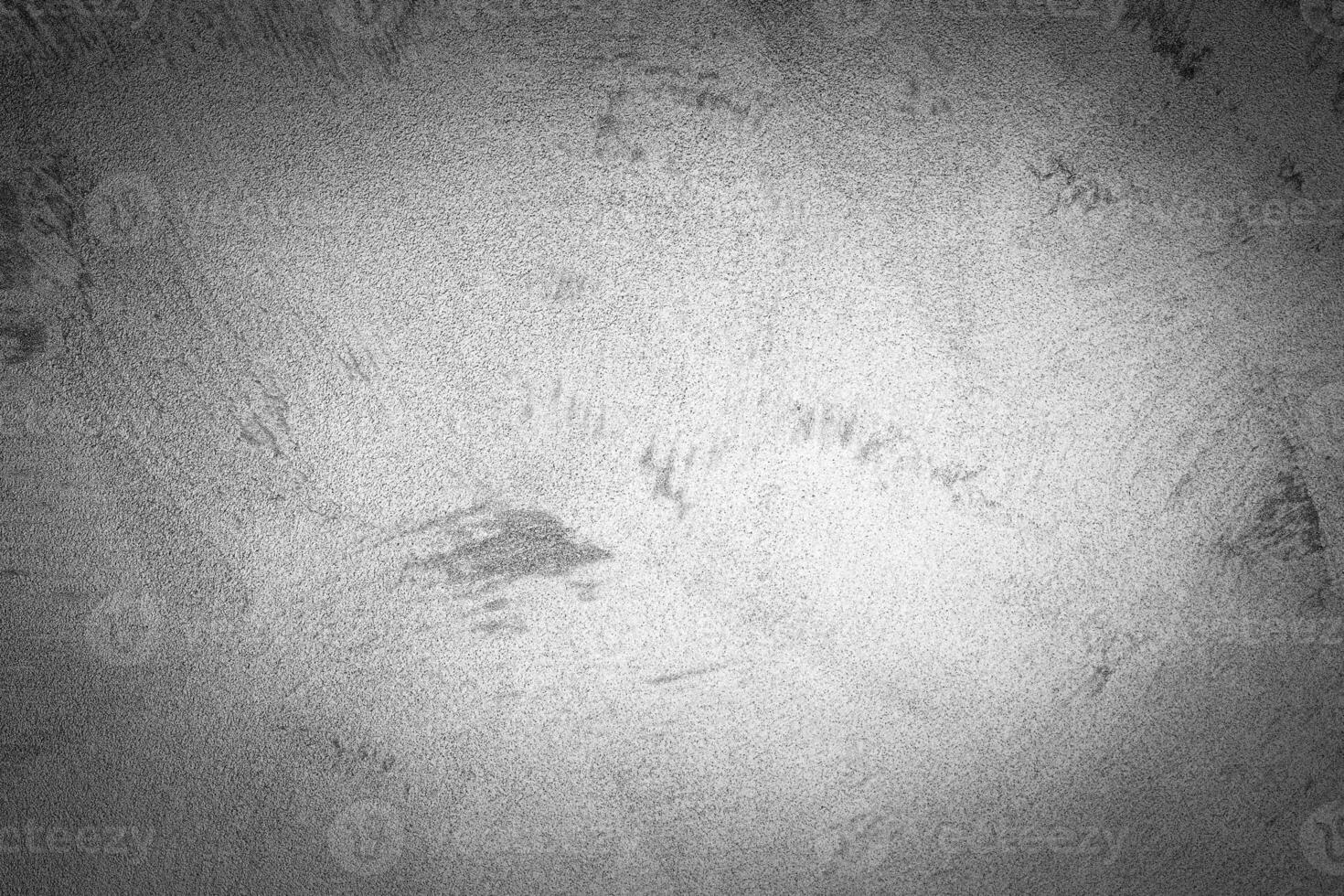 Gray decorative plaster texture with vignette. Abstract grunge background with copy space. photo