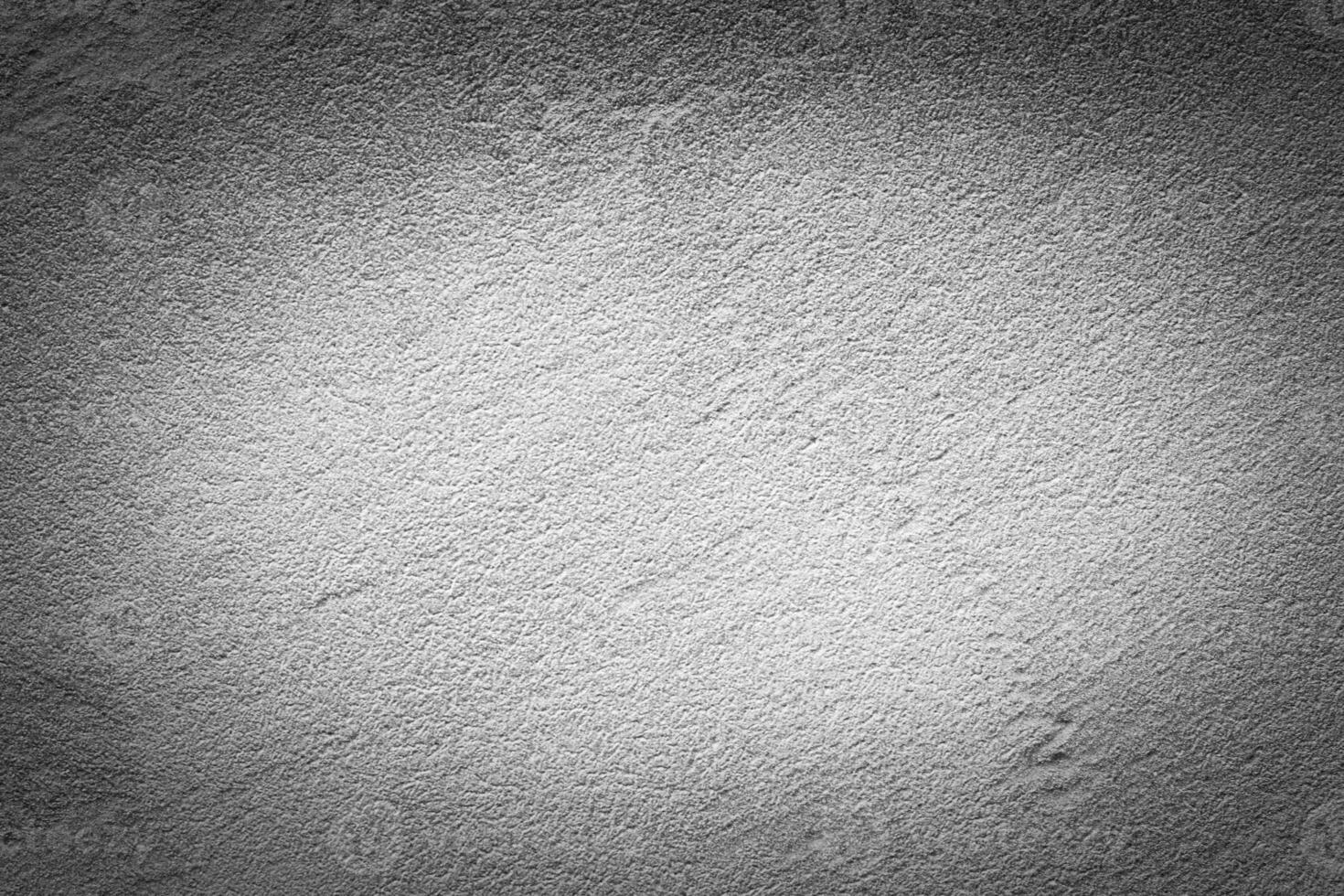 Gray decorative plaster texture with vignette. Abstract grunge background with copy space. photo