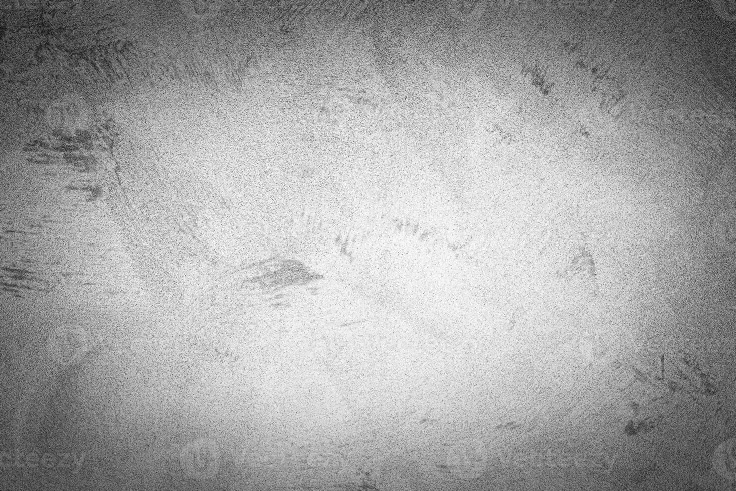 Gray decorative plaster texture with vignette. Abstract grunge background with copy space. photo