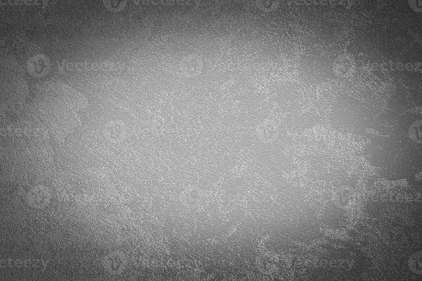 Gray decorative plaster texture with vignette. Abstract grunge background with copy space. photo
