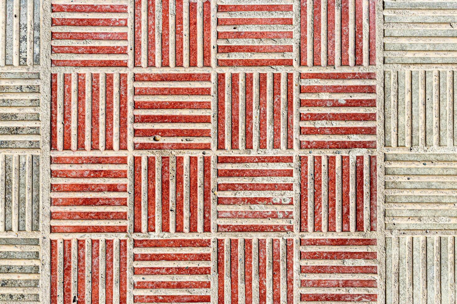Top view on paving stone road. Old pavement of concrete texture. Cobblestone sidewalk. Abstract background for design. photo