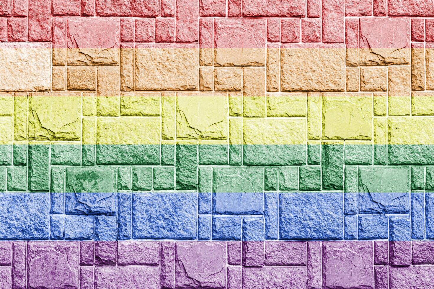 Rainbow LGBTQ or gay pride flag on decorative tiles texture. Abstract background. photo