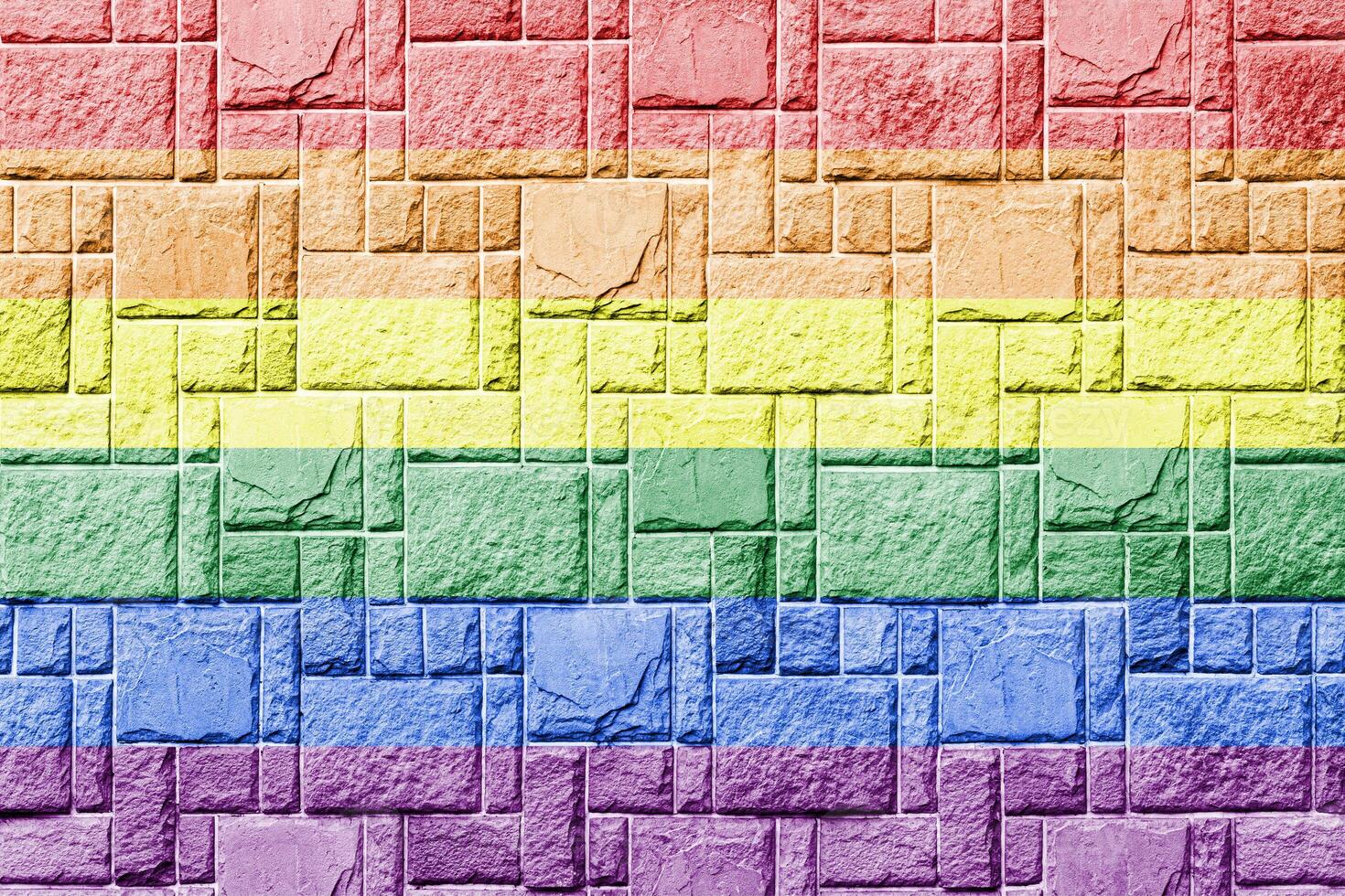 Rainbow LGBTQ or gay pride flag on decorative tiles texture. Abstract background. photo