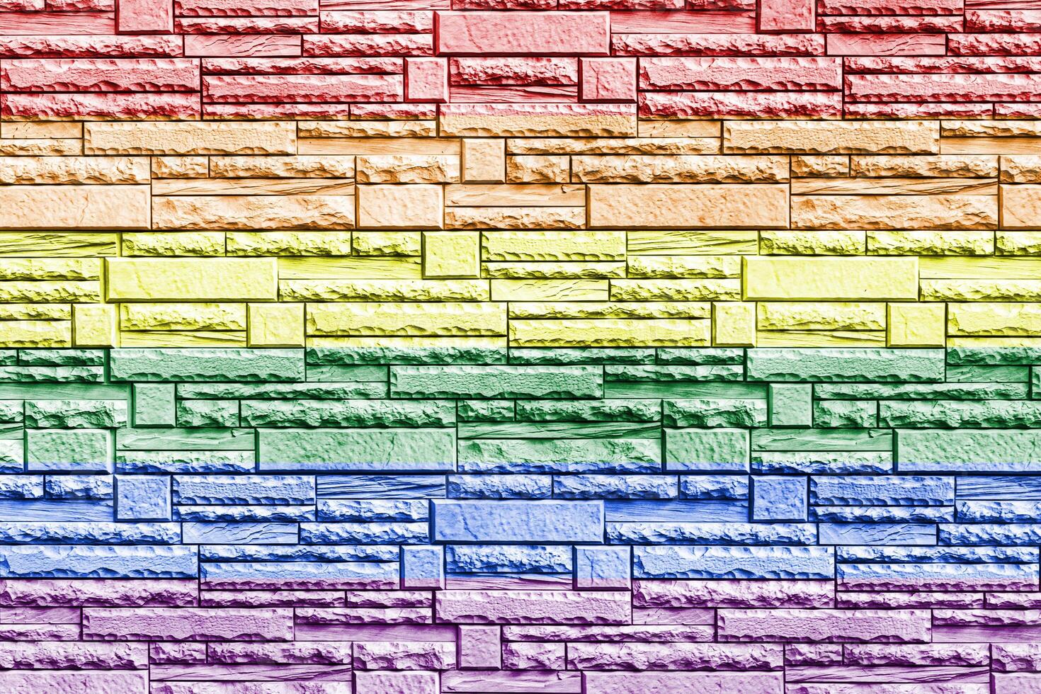 Rainbow LGBTQ or gay pride flag on decorative tiles texture. Abstract background photo