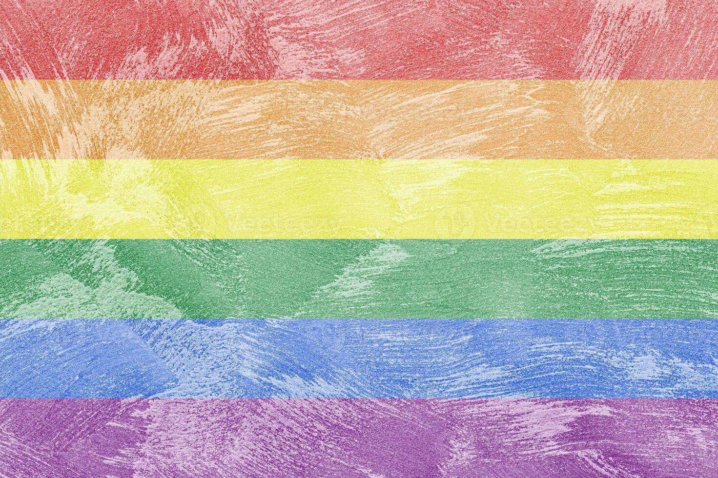 Rainbow LGBTQ or gay pride flag on decorative plaster or concrete texture. Abstract background. photo