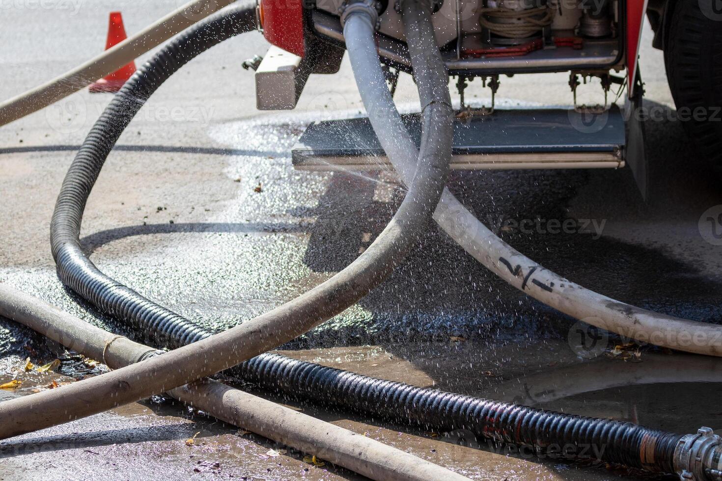 Fire engine rescue equipment. Pumps and hoses. photo