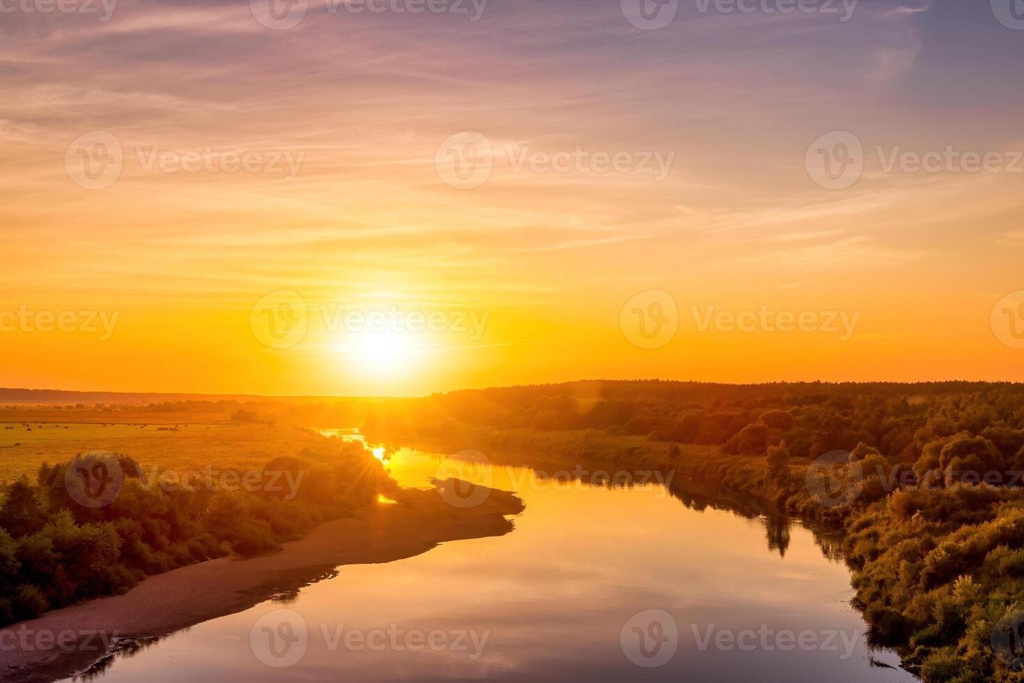 Sunset on the river at summer evening with clouds and trees. Water reflection of a sky. photo