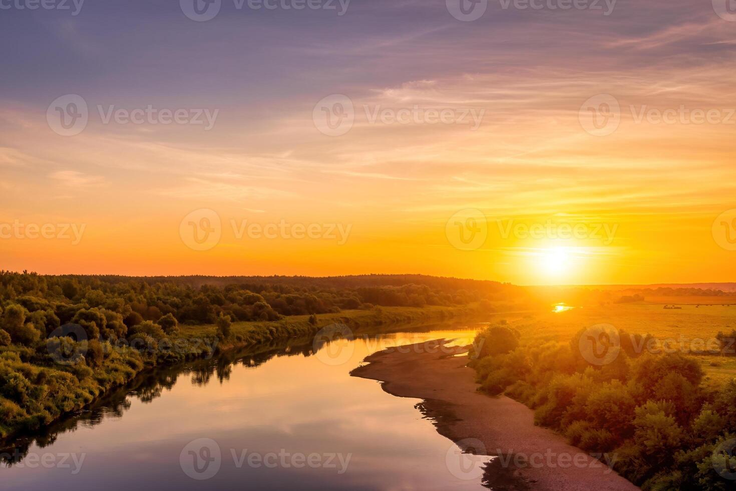 Sunset on the river at summer evening with clouds and trees. Water reflection of a sky. photo