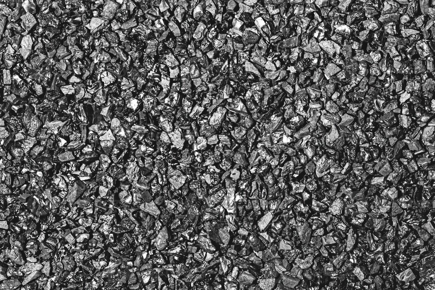 Close-up activated carbon texture. Coconut charcoal. photo