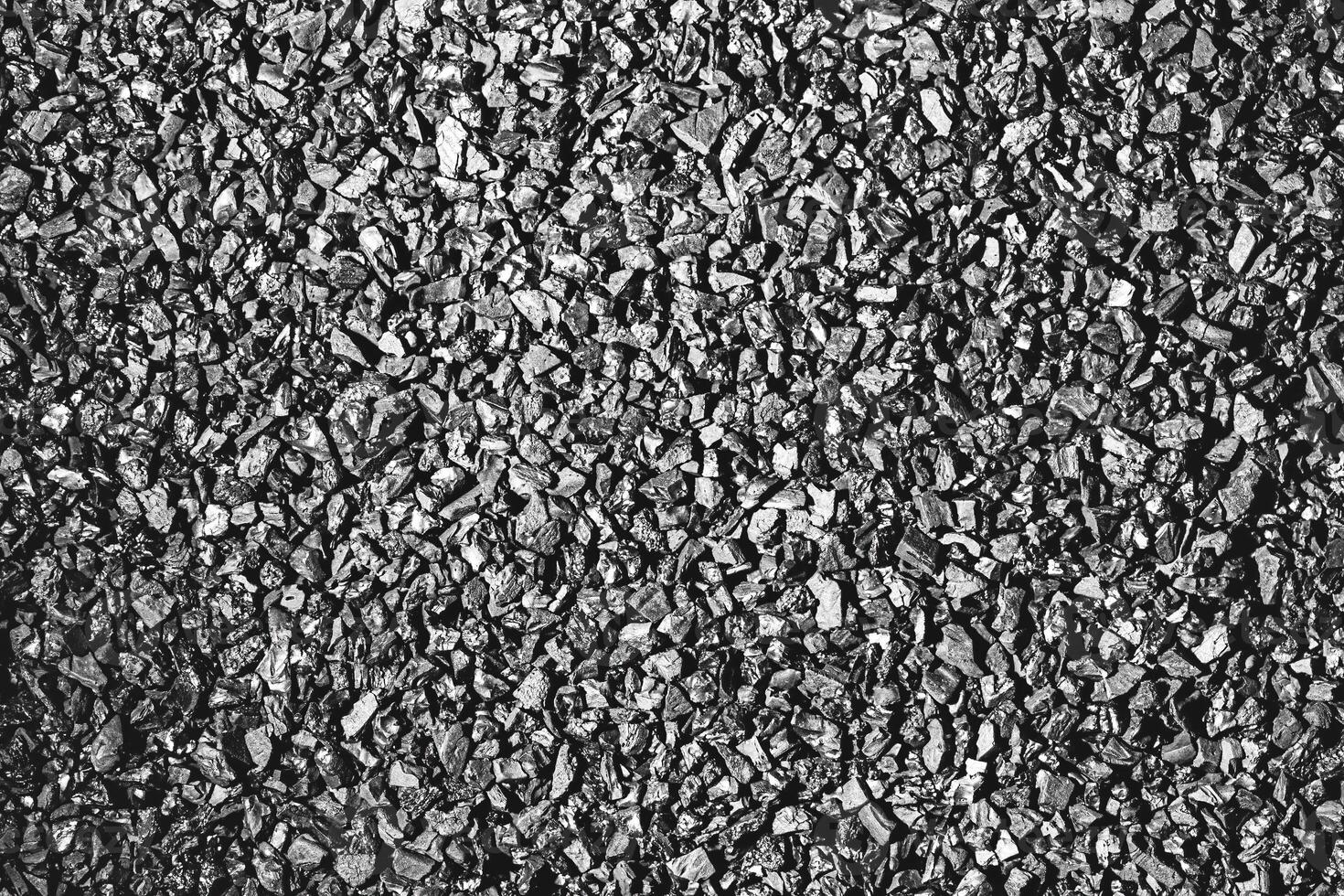 Close-up activated carbon texture. Coconut charcoal. photo