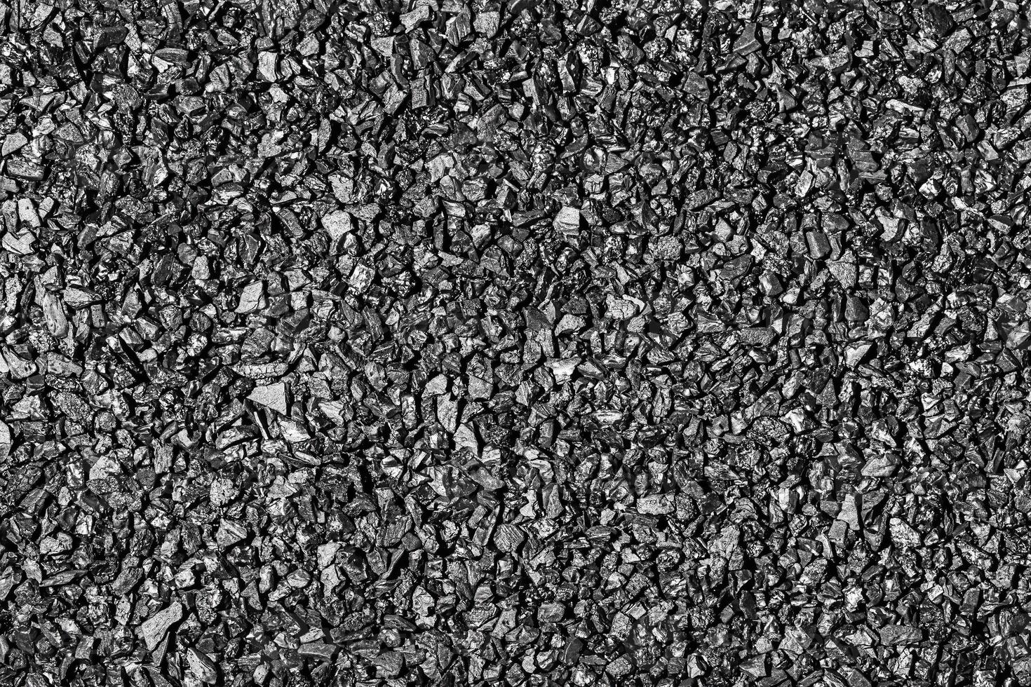 Close-up activated carbon texture. Coconut charcoal. photo