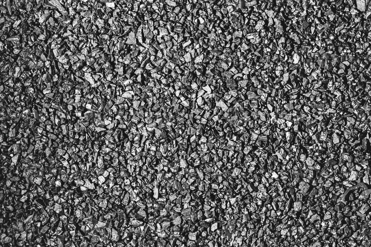 Close-up activated carbon texture. Coconut charcoal. photo