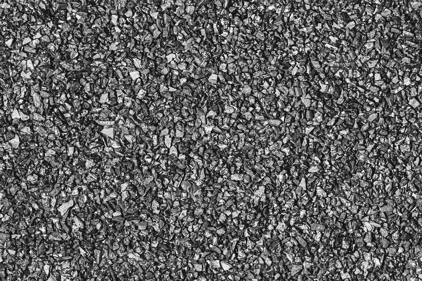 Close-up activated carbon texture. Coconut charcoal. photo