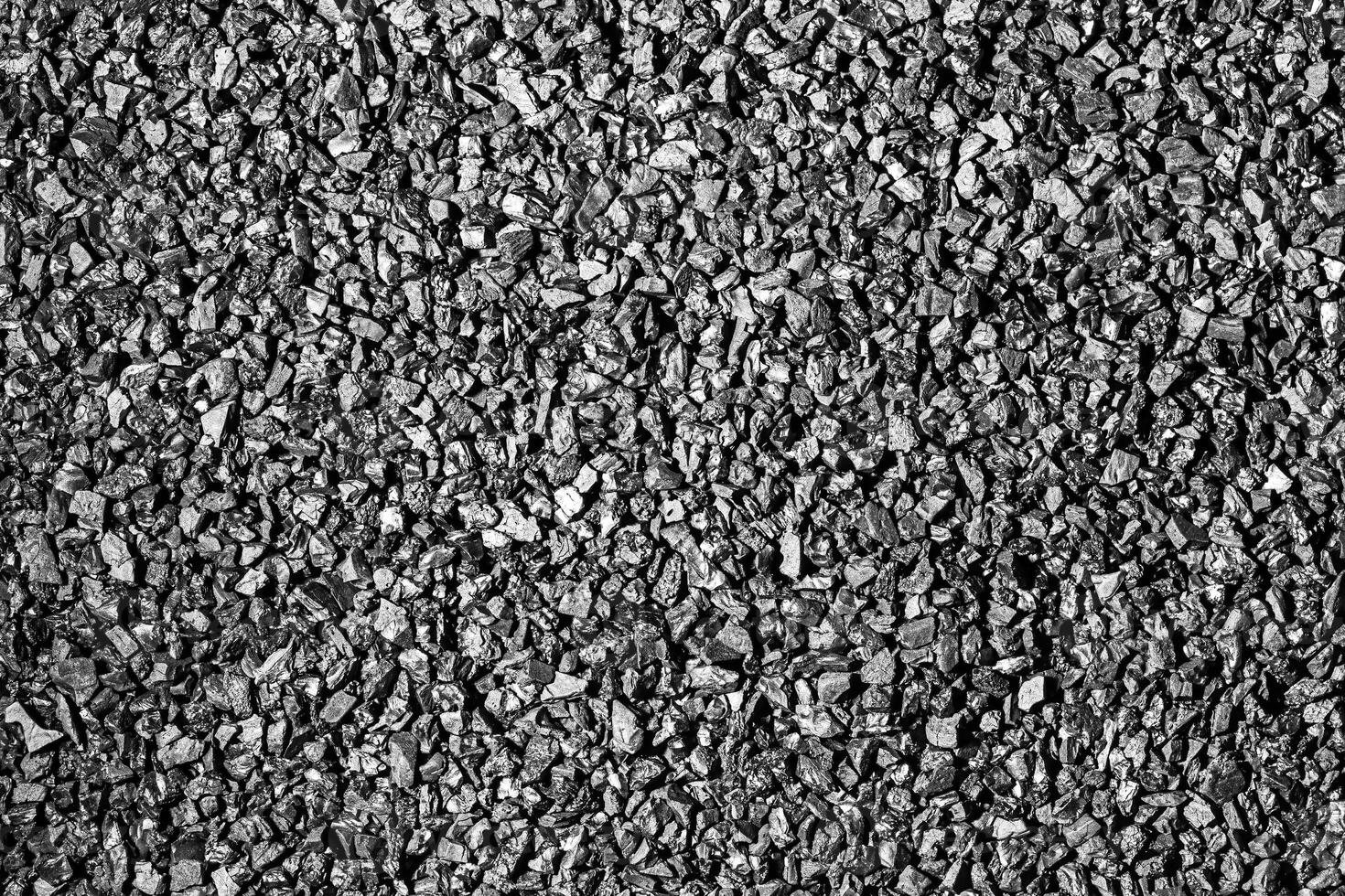 Close-up activated carbon texture. Coconut charcoal. photo
