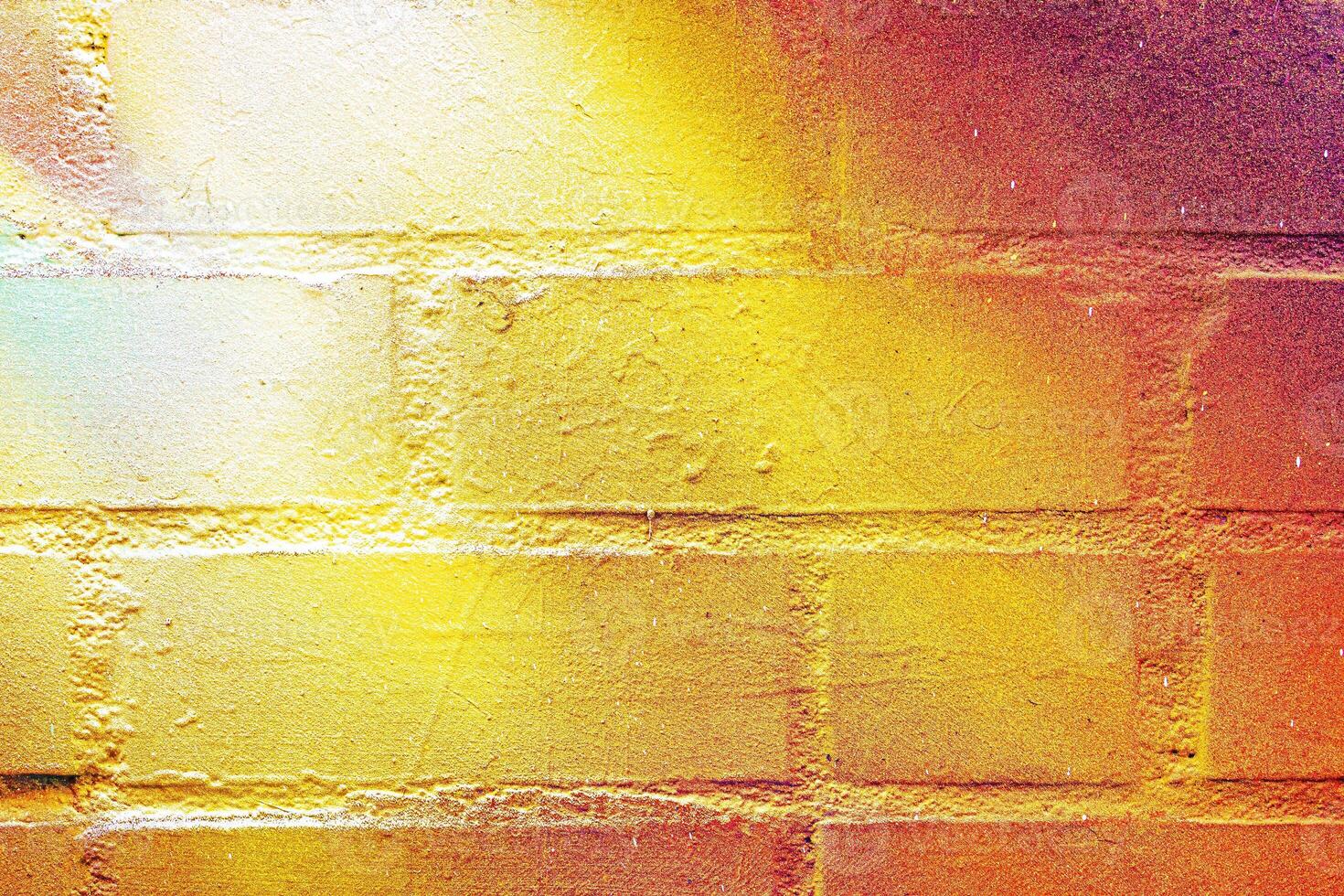 A fragment of colorful graffiti painted on a wall. Abstract urban background. photo